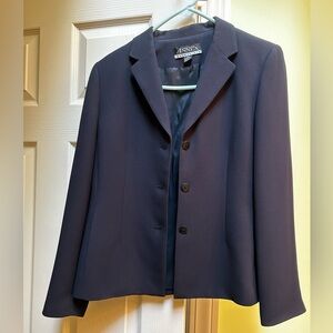 Navy 2 piece suit. Jacket is 8P. Trousers are 10 short. Traditional styling.